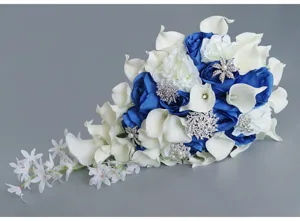 Cascade bridal bouquet with blue and white roses, calla lilies and rhinestone brooches.