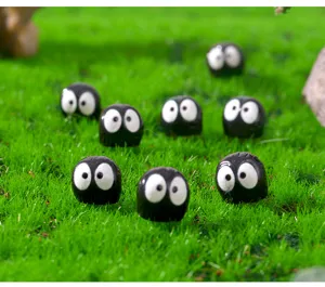 Miniatur leuchtende schwarze süße Cartoon-Geist-Figuren, perfekt für DIY-Mikrolandschaften.