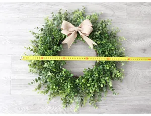 Corona di eucalipto artificiale con fiocco in juta decorazione da parete verde per la casa.