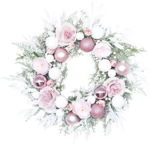 Pink Christmas floral wreath with roses and baubles for holiday home door wall decor.