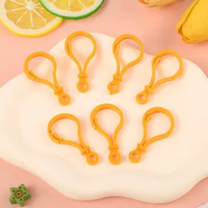 Colorful plastic bulb lobster clasps for DIY jewelry making and toy hanging accessories.
