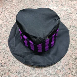 Detailed view of black top hat with purple checkered band, ideal for costume parties and shows.