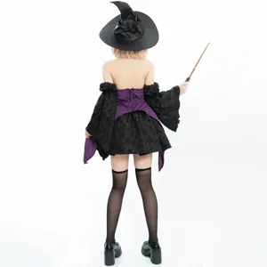 Back view of a punk style sexy witch costume with pointy hat and wand for Halloween party.