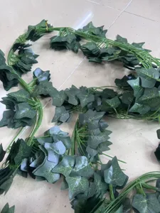 Artificial green ivy leaf vine garland for costume clothing decoration and craft use.