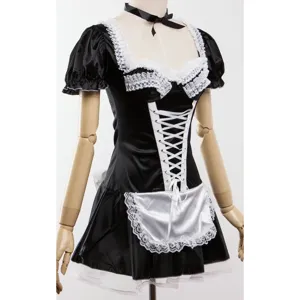 Black maid costume detail showing white lace apron, front lace-up corset and short puff sleeves.