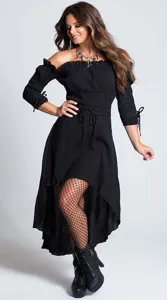 Detail view of the elegant black off-shoulder high-low vintage dress with lace-up boots.