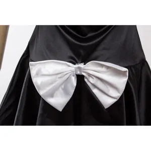 Black and white cosplay maid dress detail view featuring a large elegant satin bow decoration.