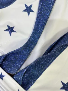 Cheerleader costume detail white blue star print sparkly glitter trim performance wear