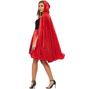 Detailed view of the red velvet hooded cape and delicate lace trim on the costume.
