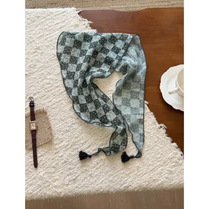 Vintage Japanese style checkered floral scarf with elegant black tassels, chic accessory.