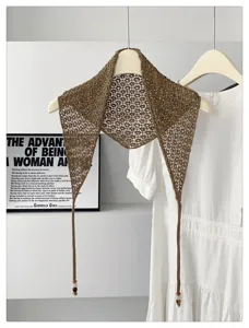 Brown hollow out knitted triangular scarf with beaded ties, perfect for layering.