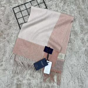 Cozy color block winter wool scarf with soft fringes, warm and stylish accessory for women.