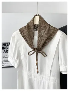 Korean style solid color beaded hollow knit triangle shawl, versatile decorative layering piece.