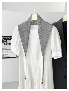 Korean style solid color beaded hollow knit triangular shawl, versatile layered accessory.