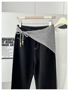 Detailed view of the Korean style hollow knitted triangle scarf wrap with beading decoration.