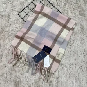 Detailed view of women winter warm plaid scarf made from 100 percent Australian wool.