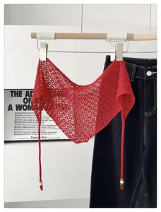 Red knit hollow out triangle scarf with beaded fringe strings, stylish layering fashion accessory.