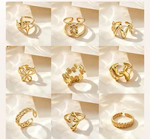 Detailed view of trendy niche design adjustable gold open rings, premium titanium steel.