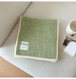 Cozy green white knit scarf for women, soft wool blend winter warmth, stylish Korean design.