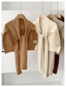 Knit sweater shawl detail, cozy winter neck warmer and stylish cape for women daily.