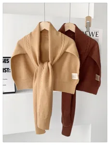 Detailed view of women wool blend knitted shawl scarf, cozy winter korean style layering cape.