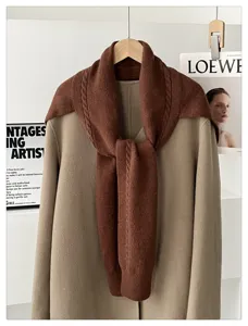 Cozy brown knitted shawl and coat layered scarf, warm autumn winter Korean fashion style.