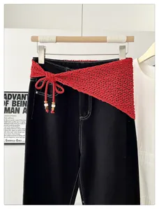 Korean style hollow knit triangle scarf with beads, stylish layering outfit for women.