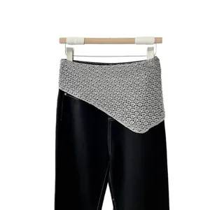 Korean style layered knit wrap waist accent with black denim pants, trendy spring summer fashion.