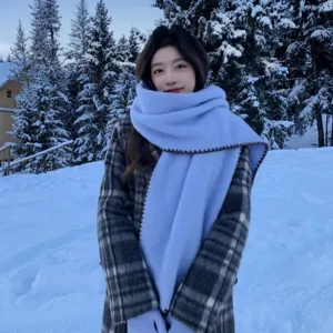 Cozy winter warm periwinkle scarf with chic zigzag edges, soft and stylish for cold weather.
