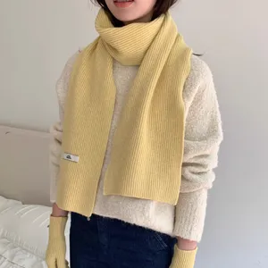 Cozy yellow ribbed knit scarf and gloves set for women, warm winter neck warmer and cold-proof wear.