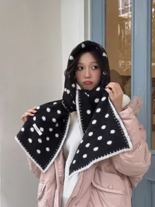 Black and white polka dot knitted scarf and hood combo, cozy winter warm fashion accessory.