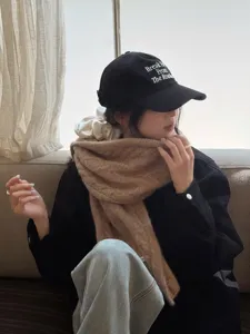 Cozy winter wool-blend scarf for women, solid color knitted tassel shawl and casual daily wear.