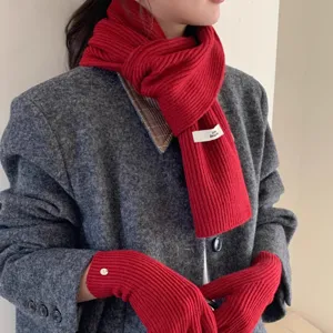 Red knitted scarf and gloves set for women, cozy winter warm neckwear accessories.