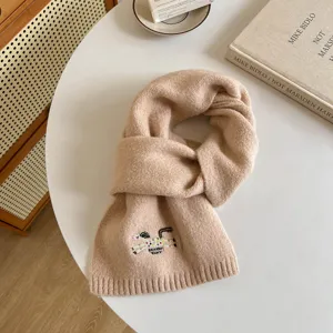 Beige knitted wool blend winter scarf for women, featuring cute embroidered pony design warm soft