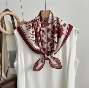 Vintage red and white floral print square scarf detail, lightweight neck wrap accessory.