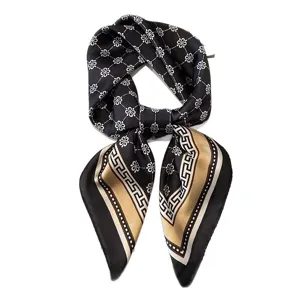 Vintage black and gold silk square scarf with classic floral pattern and elegant neckerchief style.