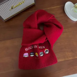 Red wool-blend knitted scarf with cute cartoon embroidery, thick and warm winter fashion accessory.