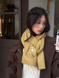 Winter warm knitted wool scarf for women with cute skiing bear embroidery and stylish design.