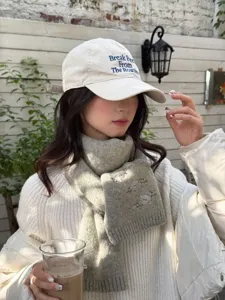 Winter warm wool blend scarf and embroidered baseball cap set for women, stylish knit.