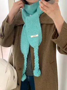 Women winter knit scarf bright blue braided pom pom stylish fashion apparel detail
