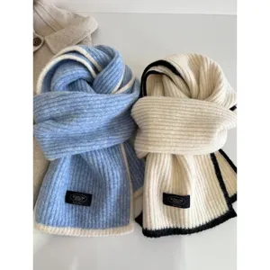 Cozy wool-blend knit scarf with chic contrast edge design for women autumn winter warmth.