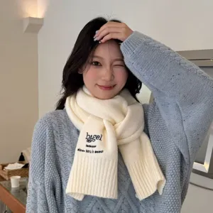 Japanese style solid color wool blend knitted scarf with embroidery and fringe details