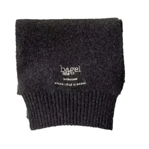 Solid color wool blend scarf for women, featuring chic embroidered lettering and cozy winter design.