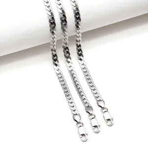 Detailed view of men's titanium steel Cuban chain necklace, trendy embossed NK chain.