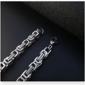 Men stainless steel Byzantine chain necklace detail, hip hop style fashion jewelry design.