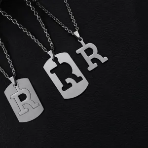 Stainless steel letter pendant necklace with multi-wear design for hip hop street style.