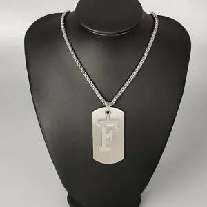 Stainless steel hip-hop dog tag necklace with cut-out letter F design for men and women.
