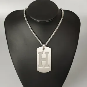 Stainless steel hip-hop dog tag necklace for men and women, featuring a bold letter H pendant.