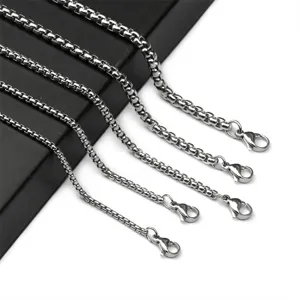 Men's stainless steel square bead chain necklace, stylish textured box chain jewelry accessory.