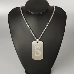 Stainless steel letter S pendant necklace, hip hop style dog tag fashion jewelry for street wear.